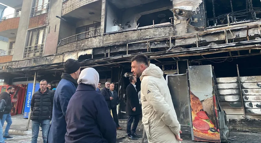 AK Parti Düzce Milletvekili Keşir'den yangında zarar gören bina sakinlerine ziyaret