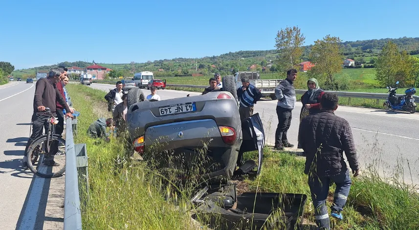 Devrilen otomobilde emniyet kemeri takılı olan çift yara almadan kurtuldu
