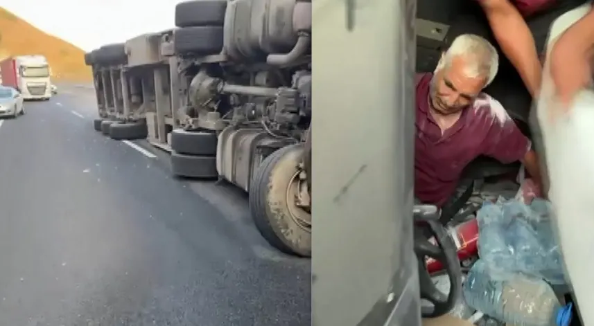 Devrilen tırda sıkışan sürücü vatandaşlar tarafından kurtarıldı