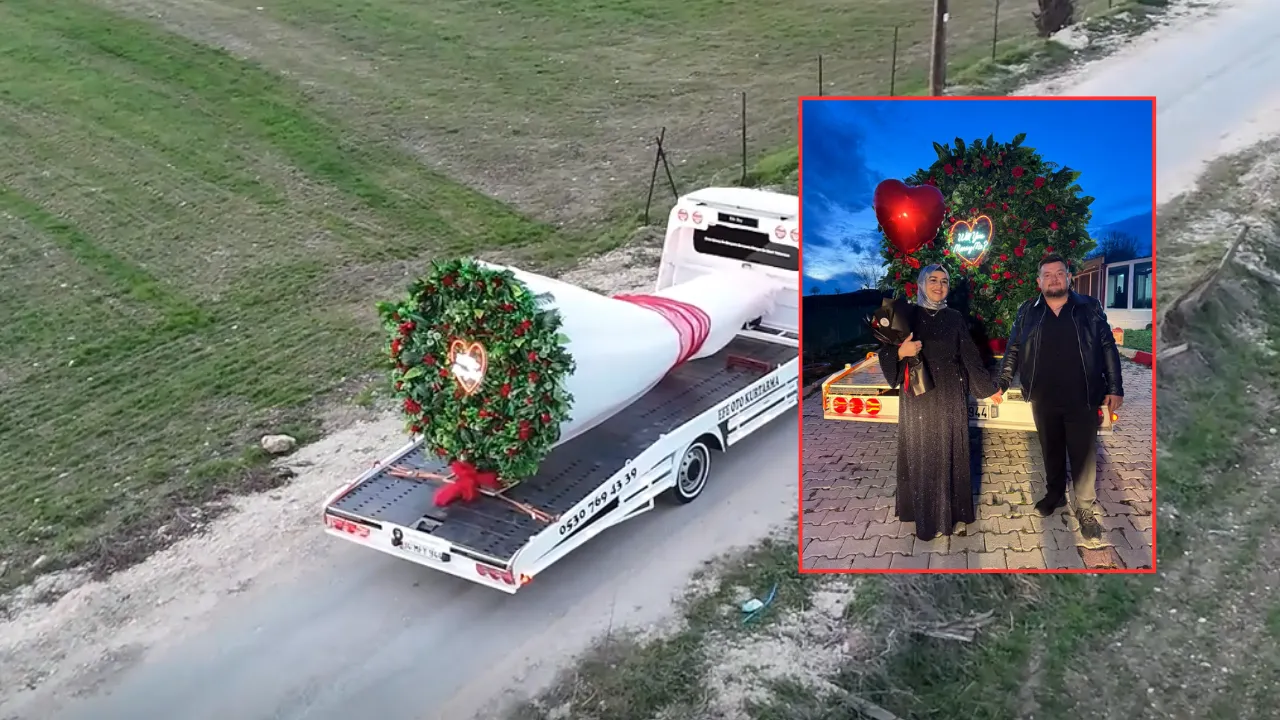 Oto kurtarıcı üzerine yerleştirdiği dev buketle evlilik teklifi etti